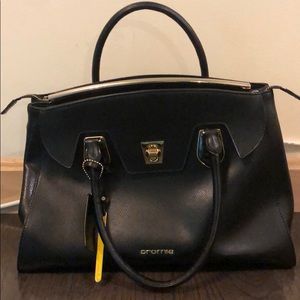 Black genuine leather satchel.